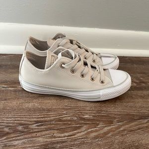 Light tan leather converse